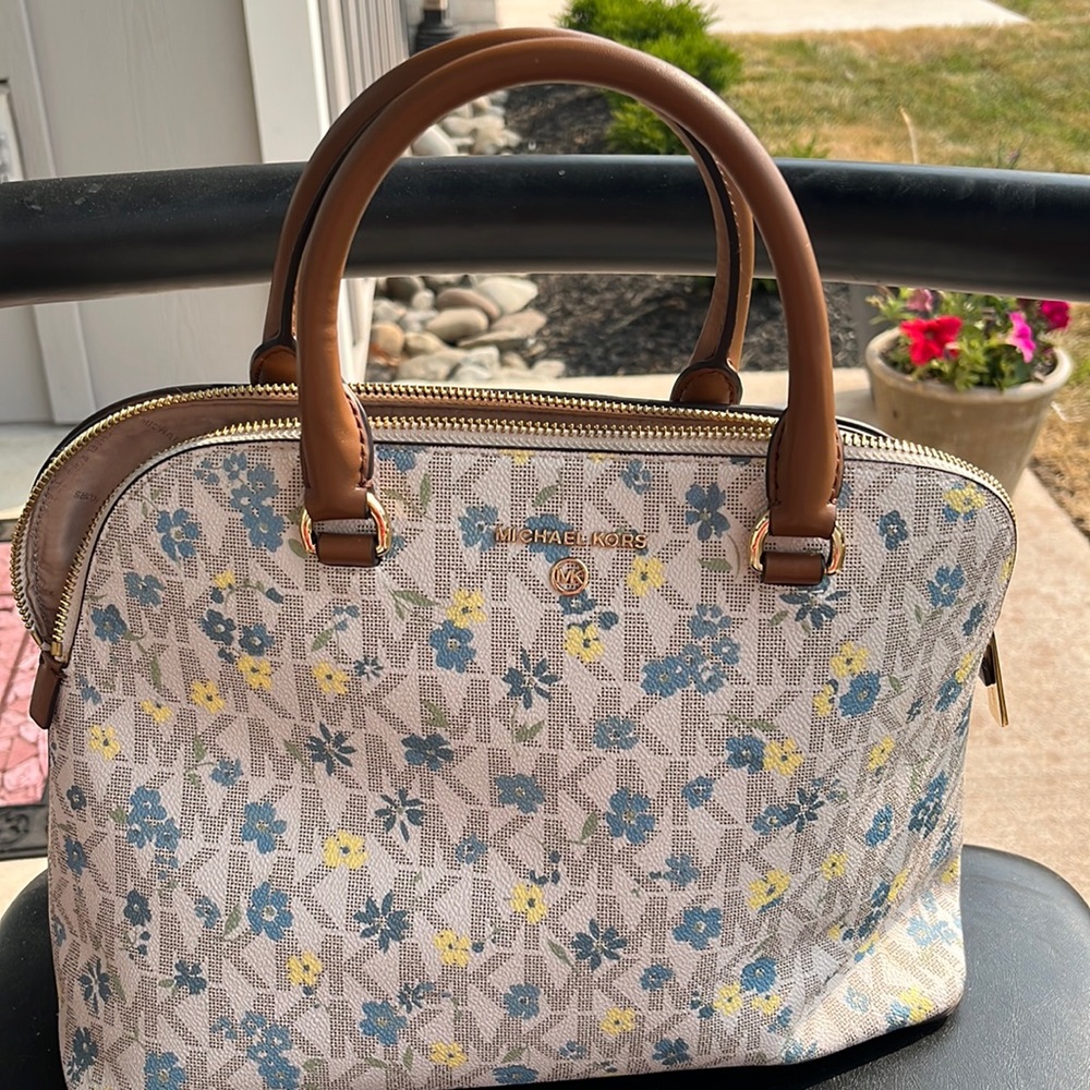 Michael kors pocketbook with flowers blue and yellow 8 “ high by 12 “ long